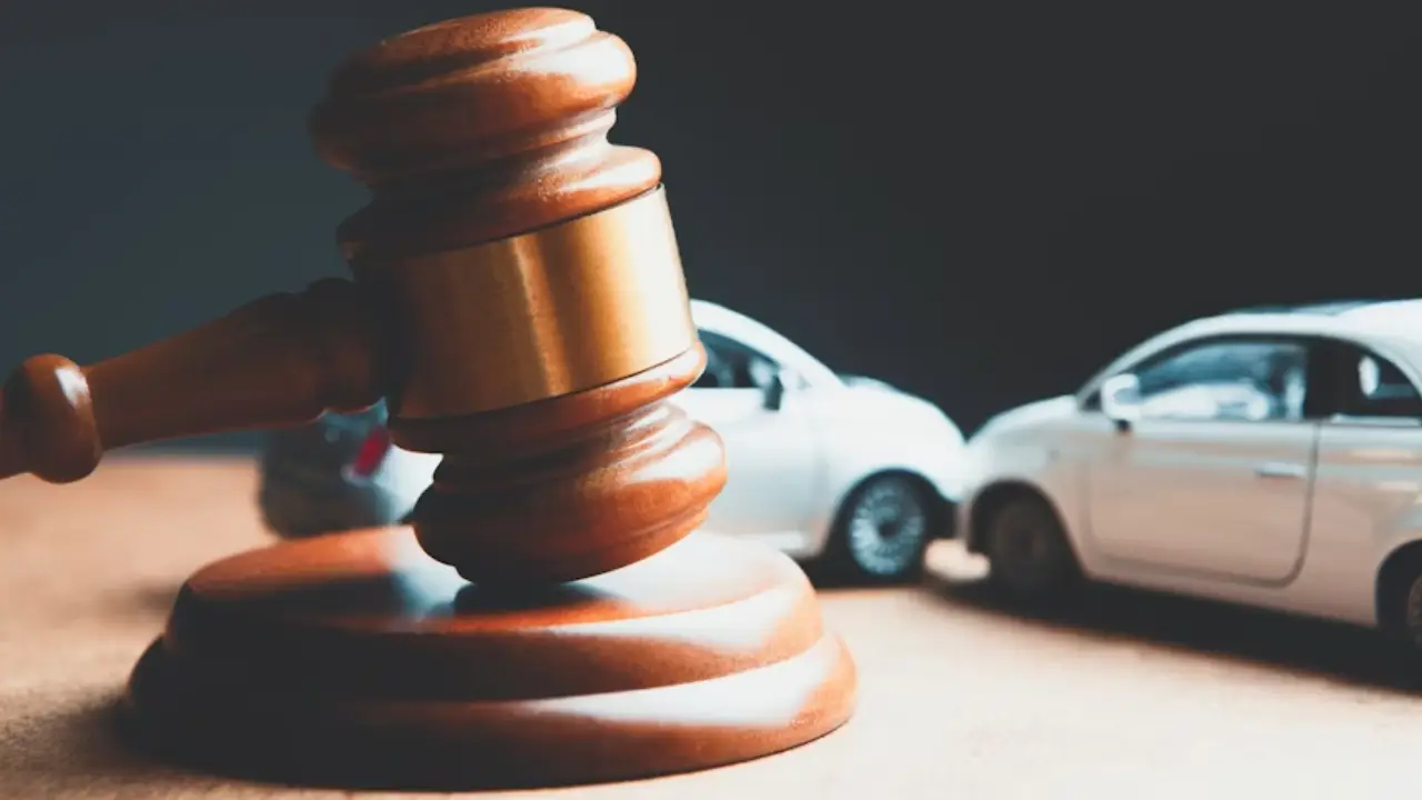 Car accident lawyer discussing case strategy with injured client