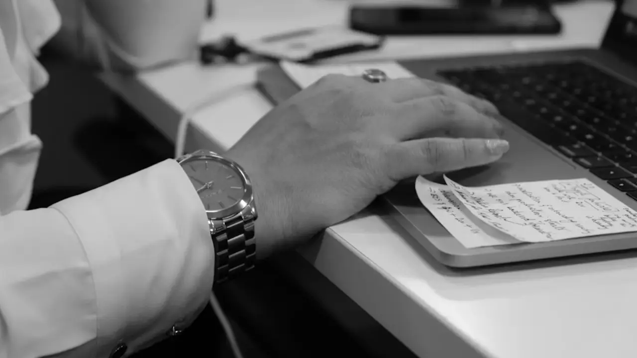 Workers compensation attorney reviewing a client's case documents